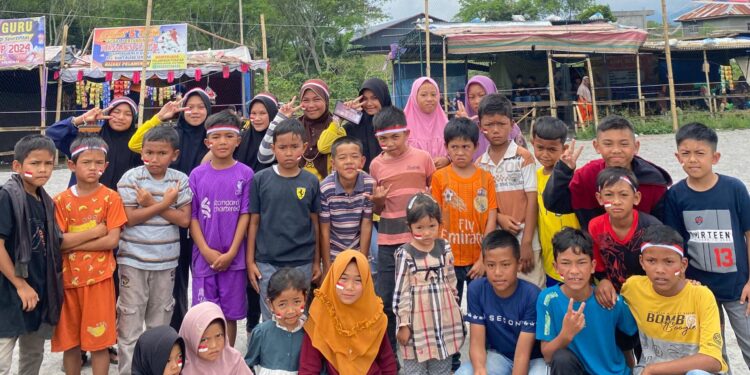 Keseruan anak-anak desa reje guru dalam kegiatan perlombaan 17 Agustusan,
Photo: gemapers