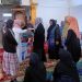 Ketua Tim Penggerak PKK Kabupaten Bener Meriah, Hj. Meutia Fauziah Tagore saat menyalurkan bantuan kepada masyarakat korban bencana. Jum'at (9/1/2026). Foto: Ist